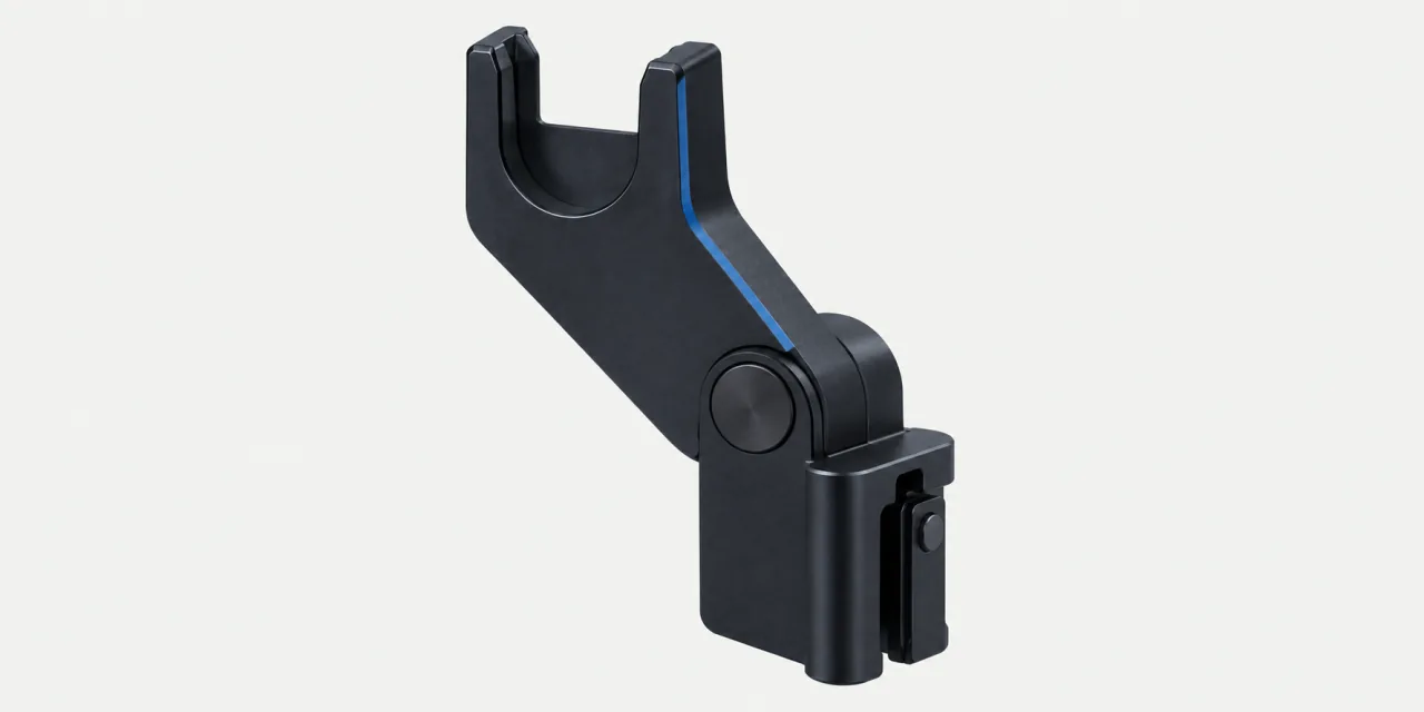 Adaptateur noir à fourche photographié seul sur fond clair, comme une pièce de catalogue